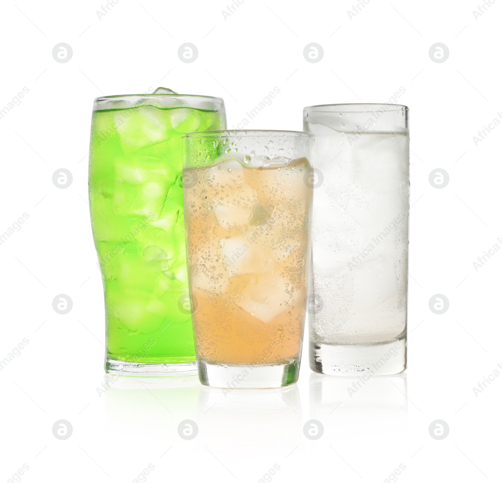 Photo of Delicious refreshing drinks in glasses on white background