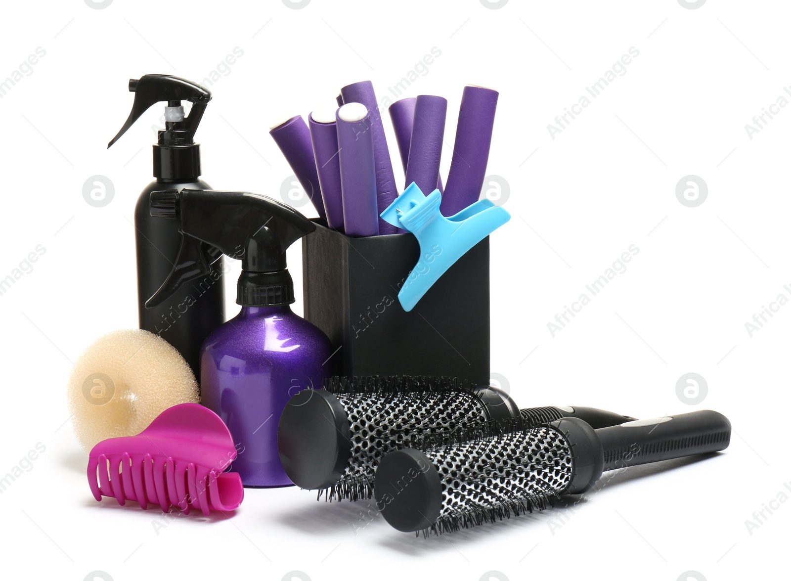 Photo of Set of professional hairdresser's tools on white background