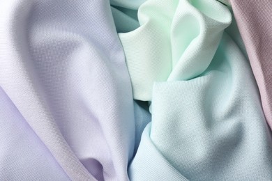 Photo of Different crumpled fabrics as background, top view