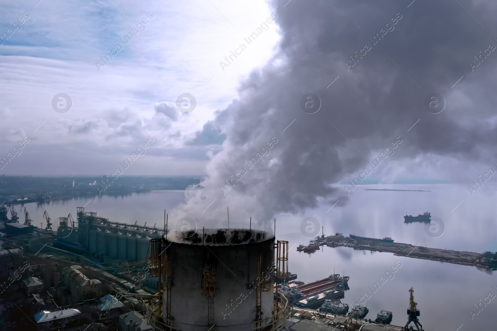 Image of Polluting air with smoke, aerial view of industrial factory. CO2 emissions