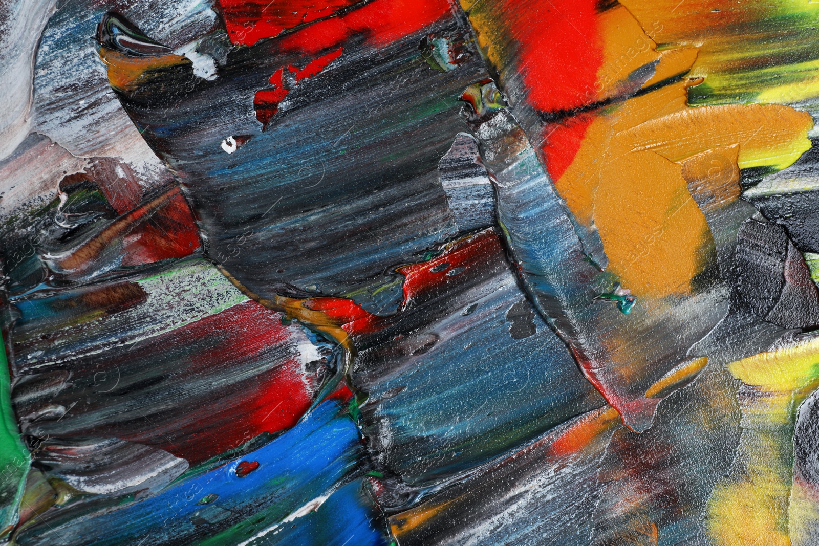 Photo of Abstract colorful acrylic paint as background, top view