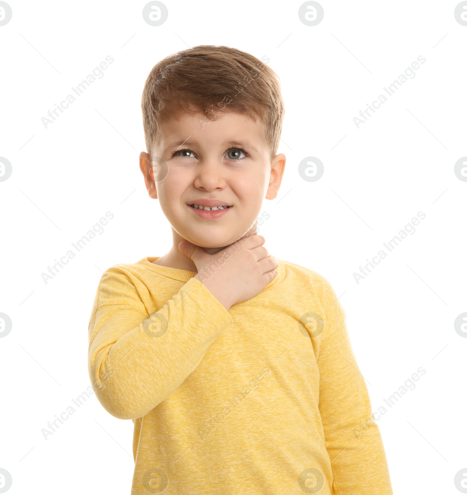 Photo of Cute boy suffering from cough on white background