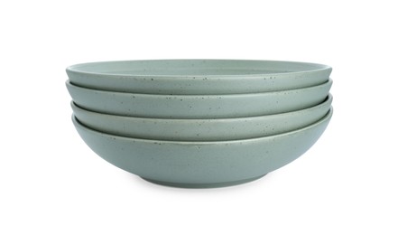 Photo of Beautiful green ceramic bowls isolated on white
