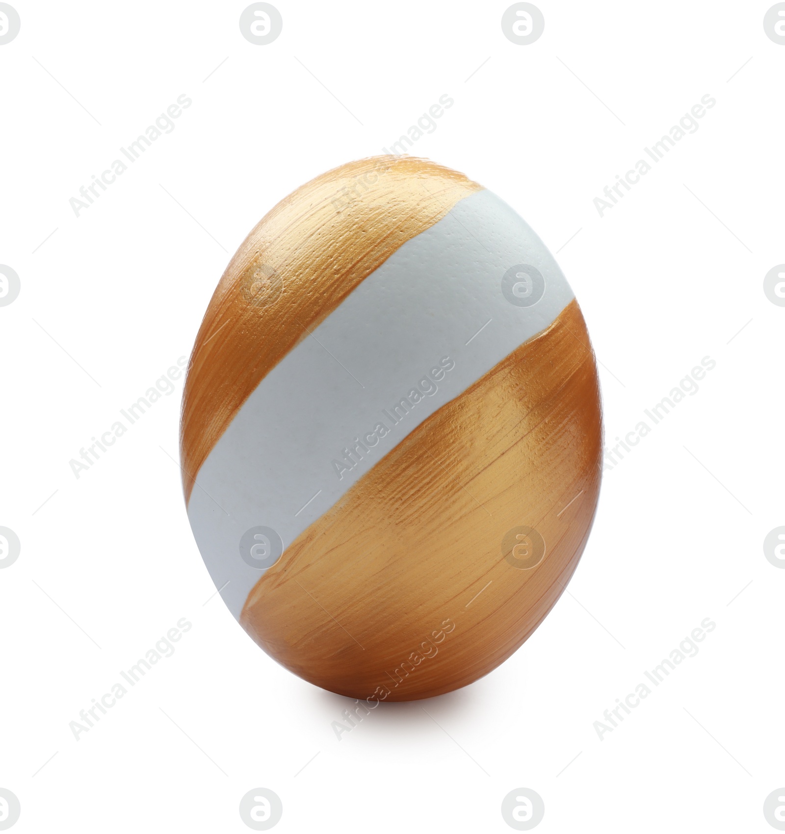 Photo of Traditional Easter egg decorated with golden paint on white background