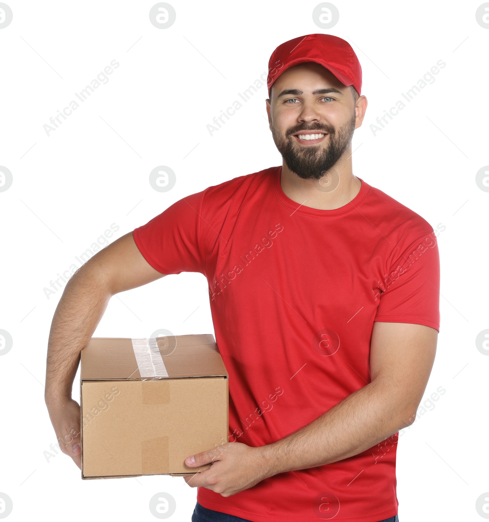 Photo of Happy young courier with cardboard box on white background