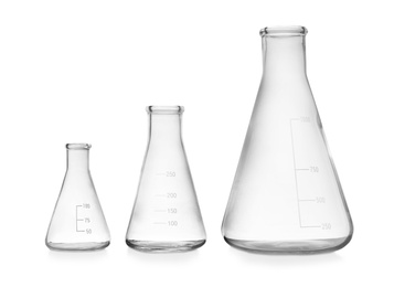 Photo of Empty conical flasks on white background. Laboratory glassware