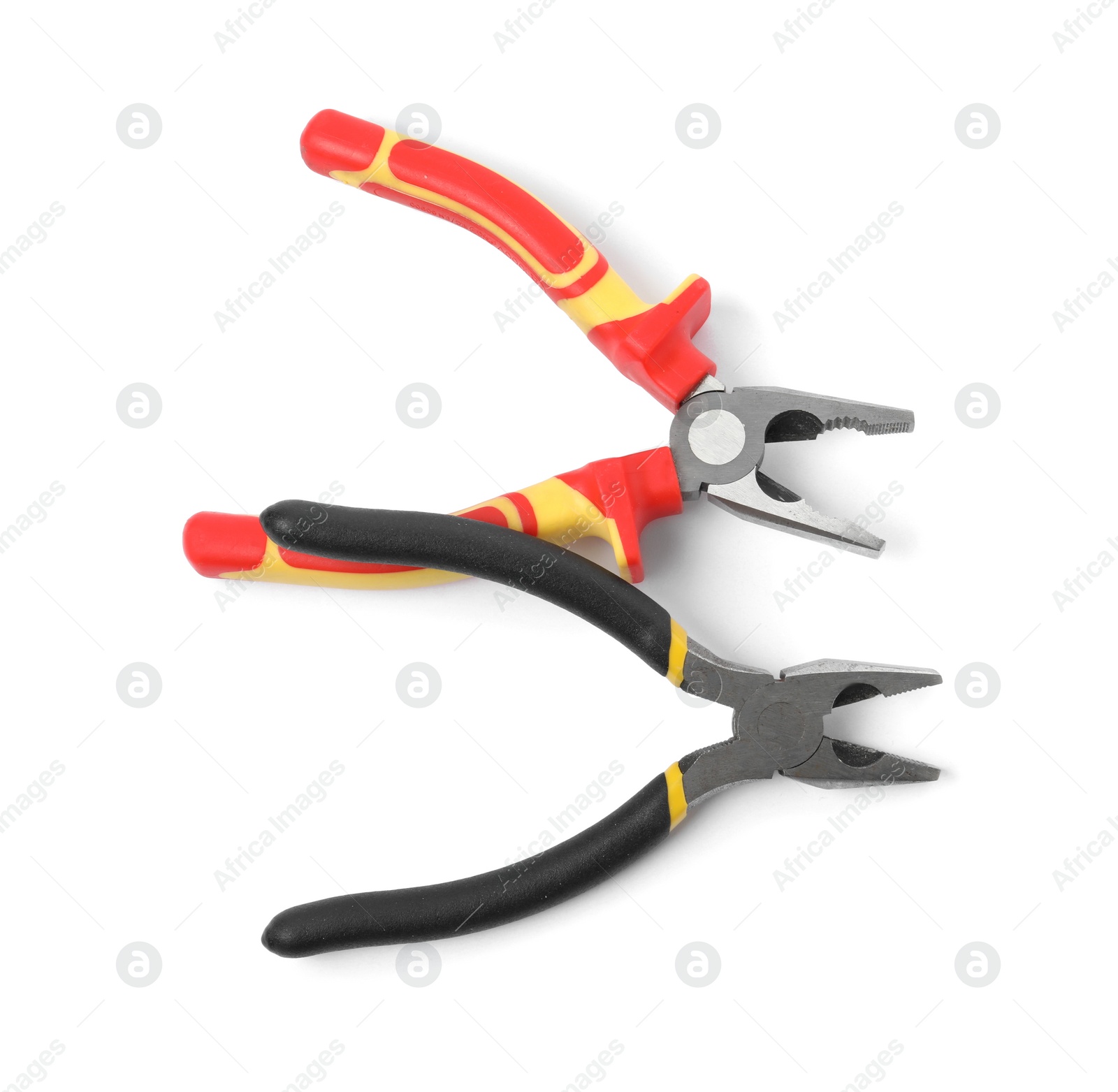 Photo of Different pliers isolated on white, top view