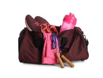 Photo of Sports bag with gym stuff isolated on white