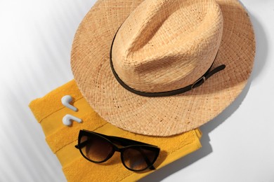 Photo of Flat lay composition with beach accessories on white background