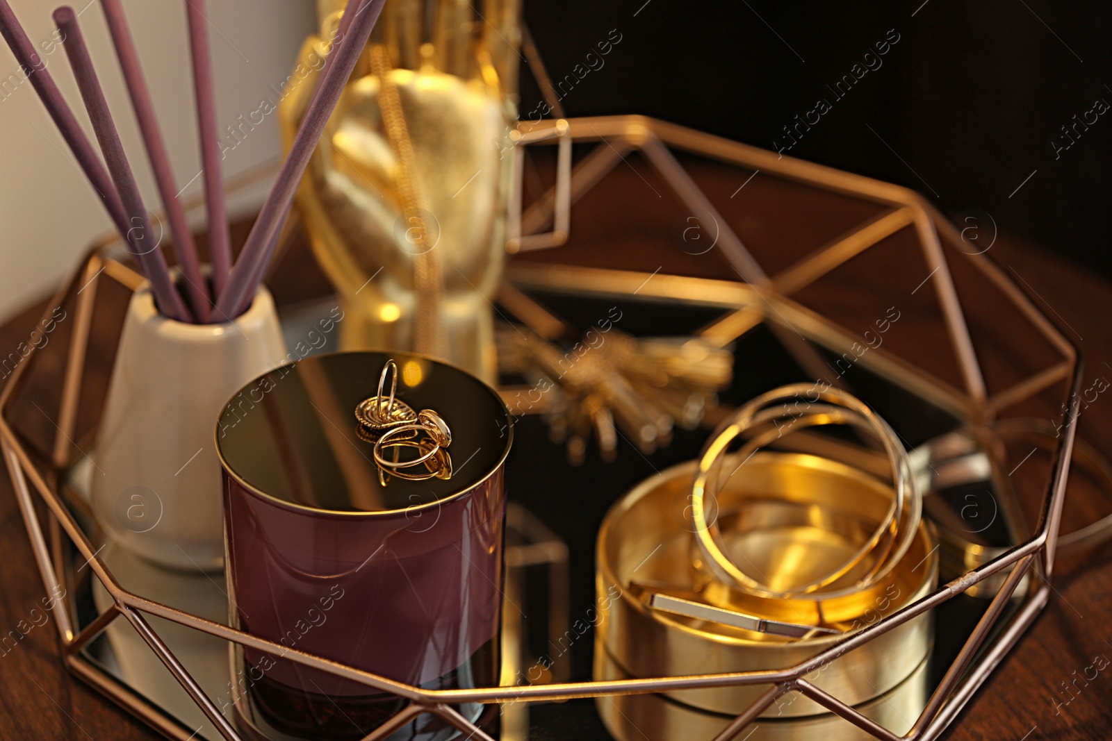 Photo of Composition with stylish accessories and interior elements on table, closeup