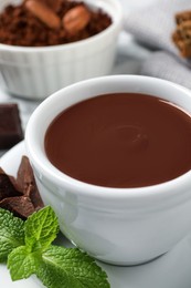 Photo of Cup of yummy hot chocolate in cup, closeup