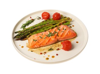 Photo of Tasty grilled salmon with tomatoes, asparagus and spices isolated on white