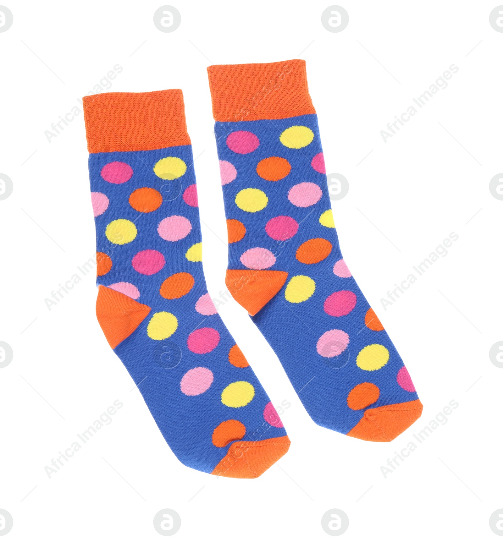 Photo of Colorful socks on white background, top view