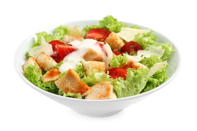 Image of Delicious fresh Caesar salad in bowl on white background 