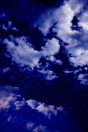 Image of Beautiful view of night sky with clouds and stars