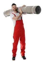 Photo of Male worker with rolled carpet on white background