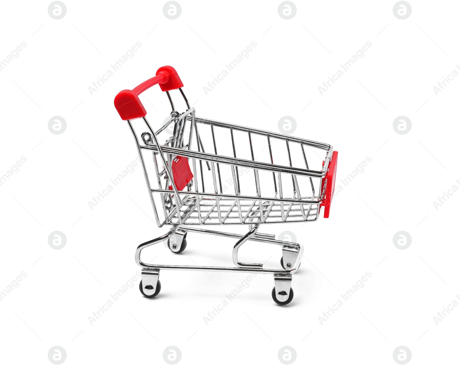 Photo of Empty mini metal shopping cart isolated on white