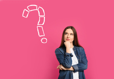 Image of Emotional woman with drawing of question mark on pink background