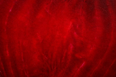 Cut fresh red beet as background, closeup view