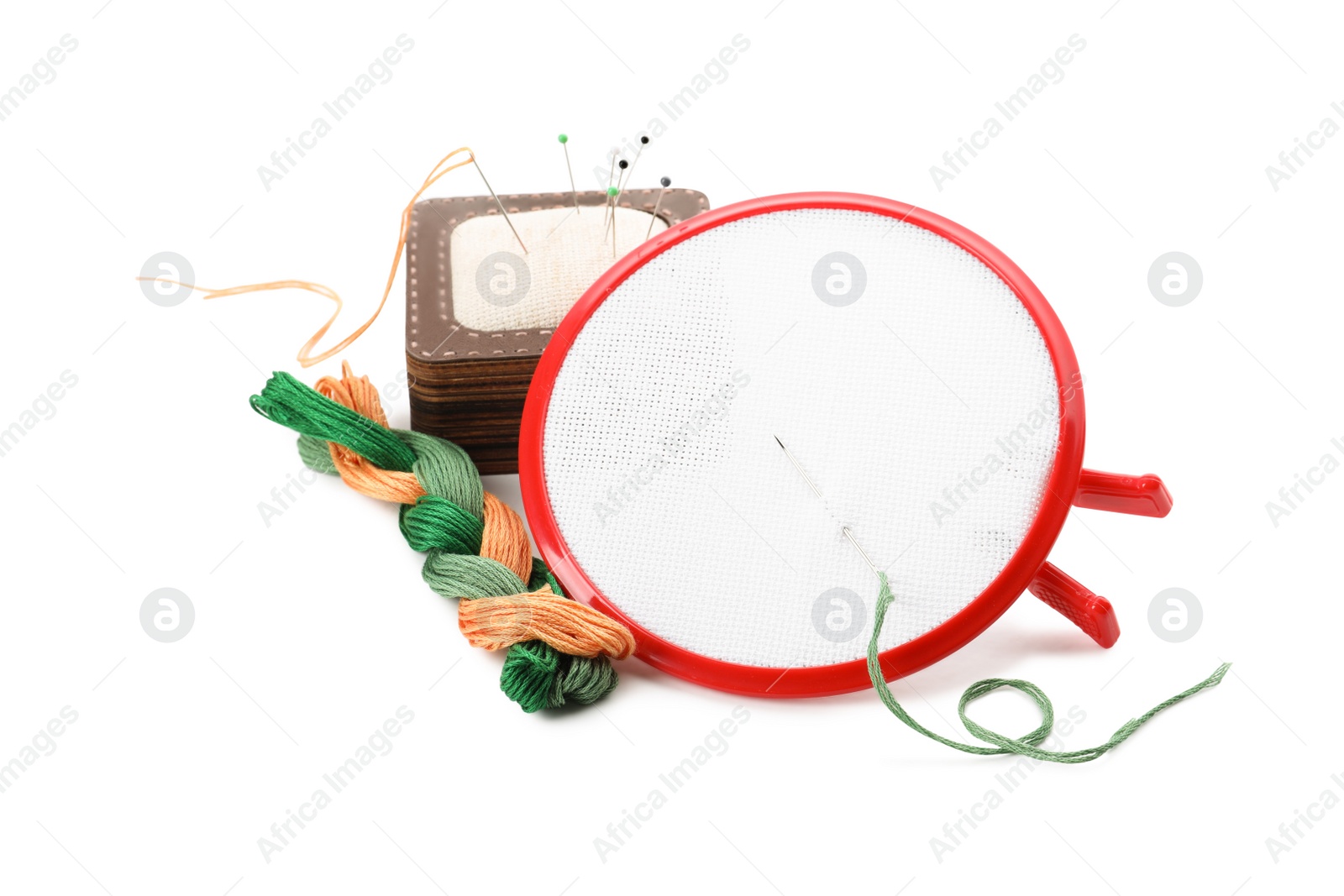 Photo of Set of embroidery equipment on white background