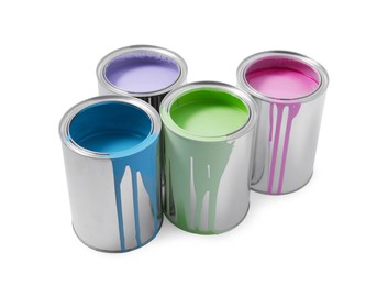 Cans of colorful paints isolated on white