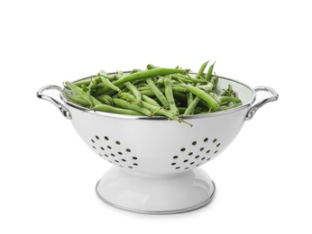 Photo of Fresh green beans in colander isolated on white