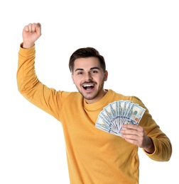 Portrait of happy young man with money on white background