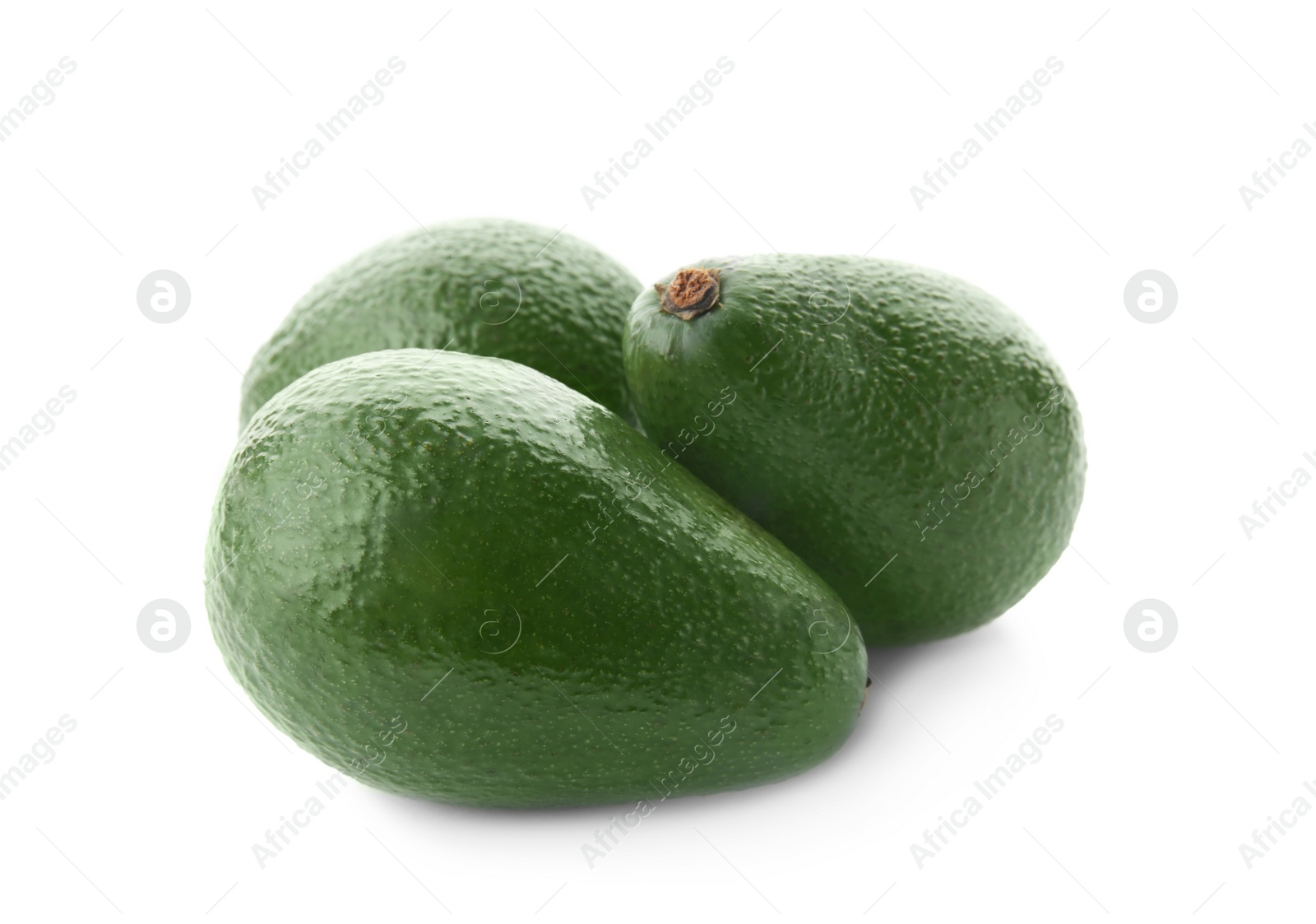 Photo of Ripe avocados on white background. Tropical fruit