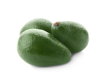 Photo of Ripe avocados on white background. Tropical fruit