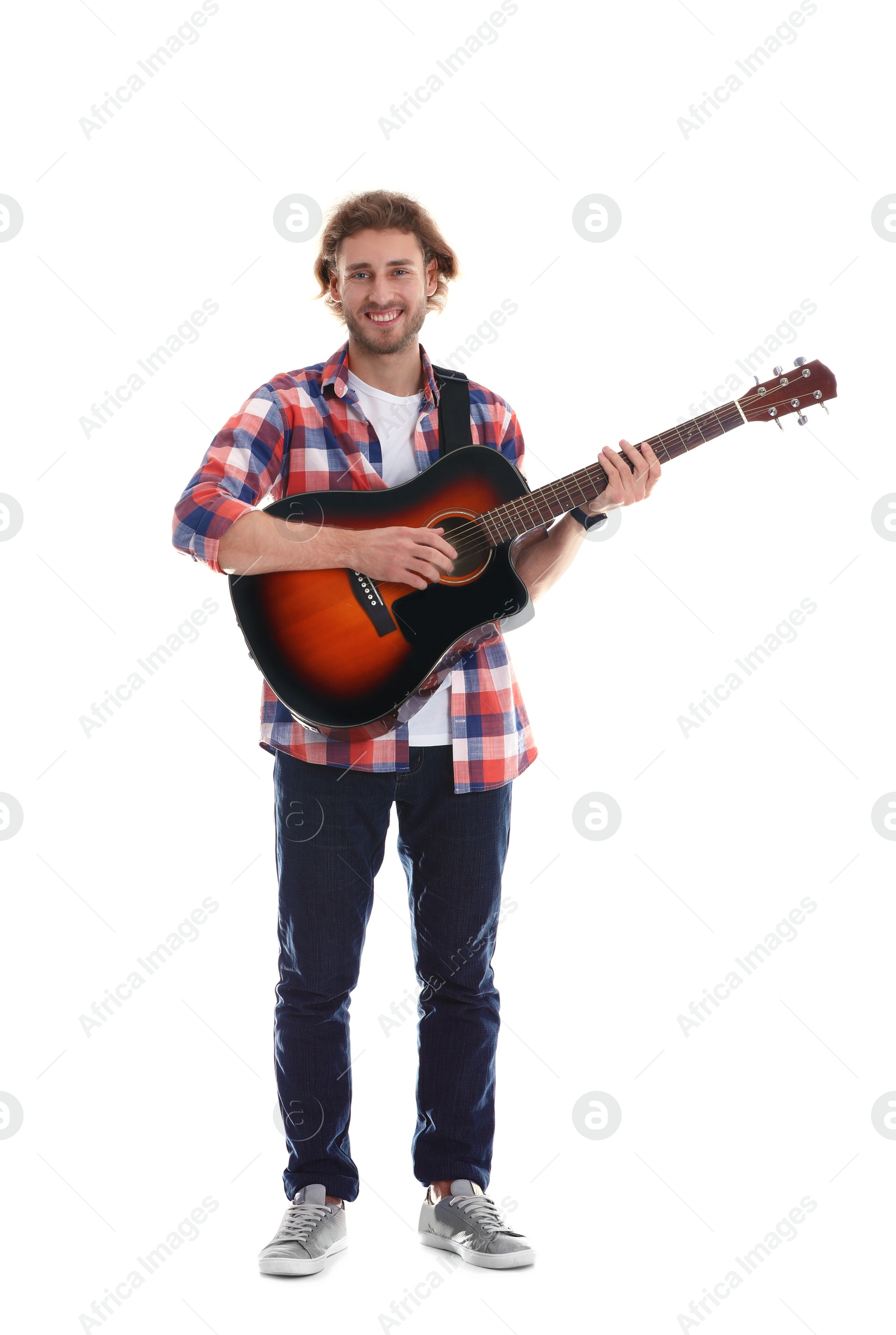 Photo of Young man playing acoustic guitar on white background