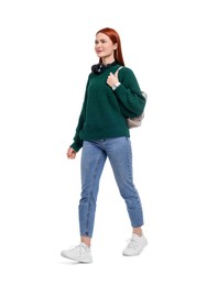 Woman with headphones and backpack on white background