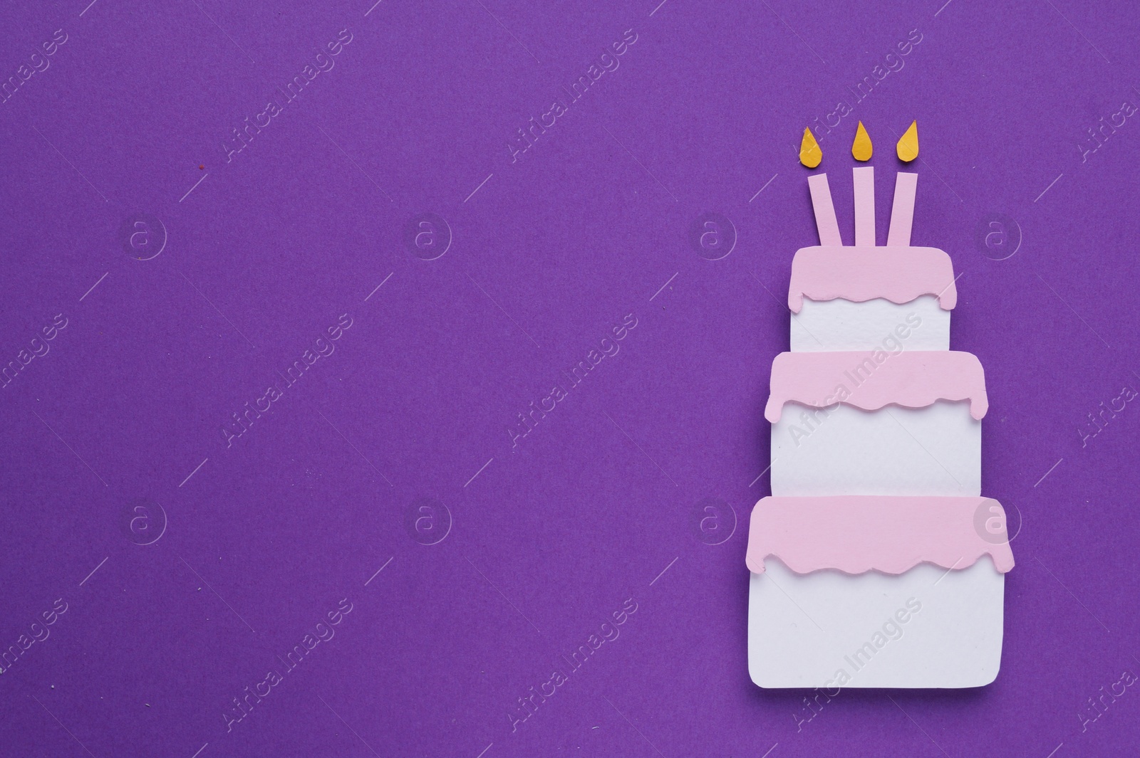 Photo of Birthday party. Paper cake on purple background, top view with space for text