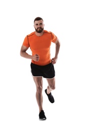 Young man in sportswear running on white background