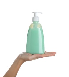 Photo of Woman holding liquid soap dispenser on white background, closeup