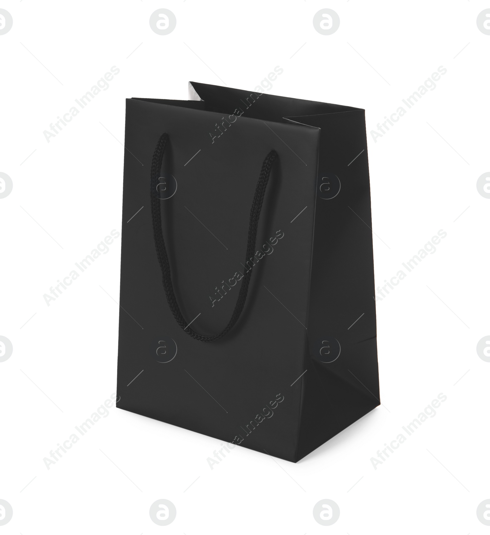 Photo of One black paper bag isolated on white