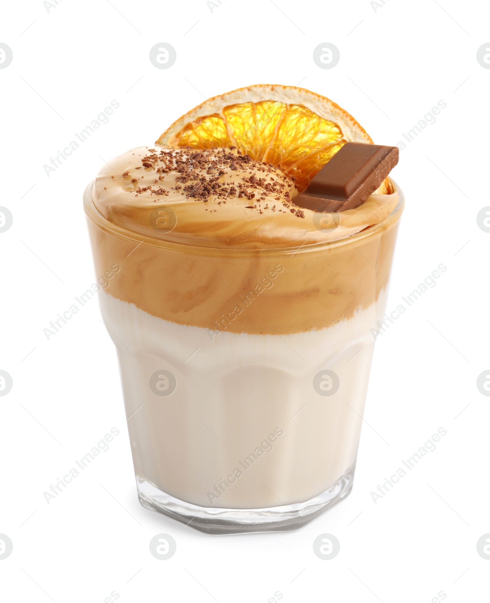 Photo of Glass of delicious dalgona coffee with dry orange and chocolate isolated on white