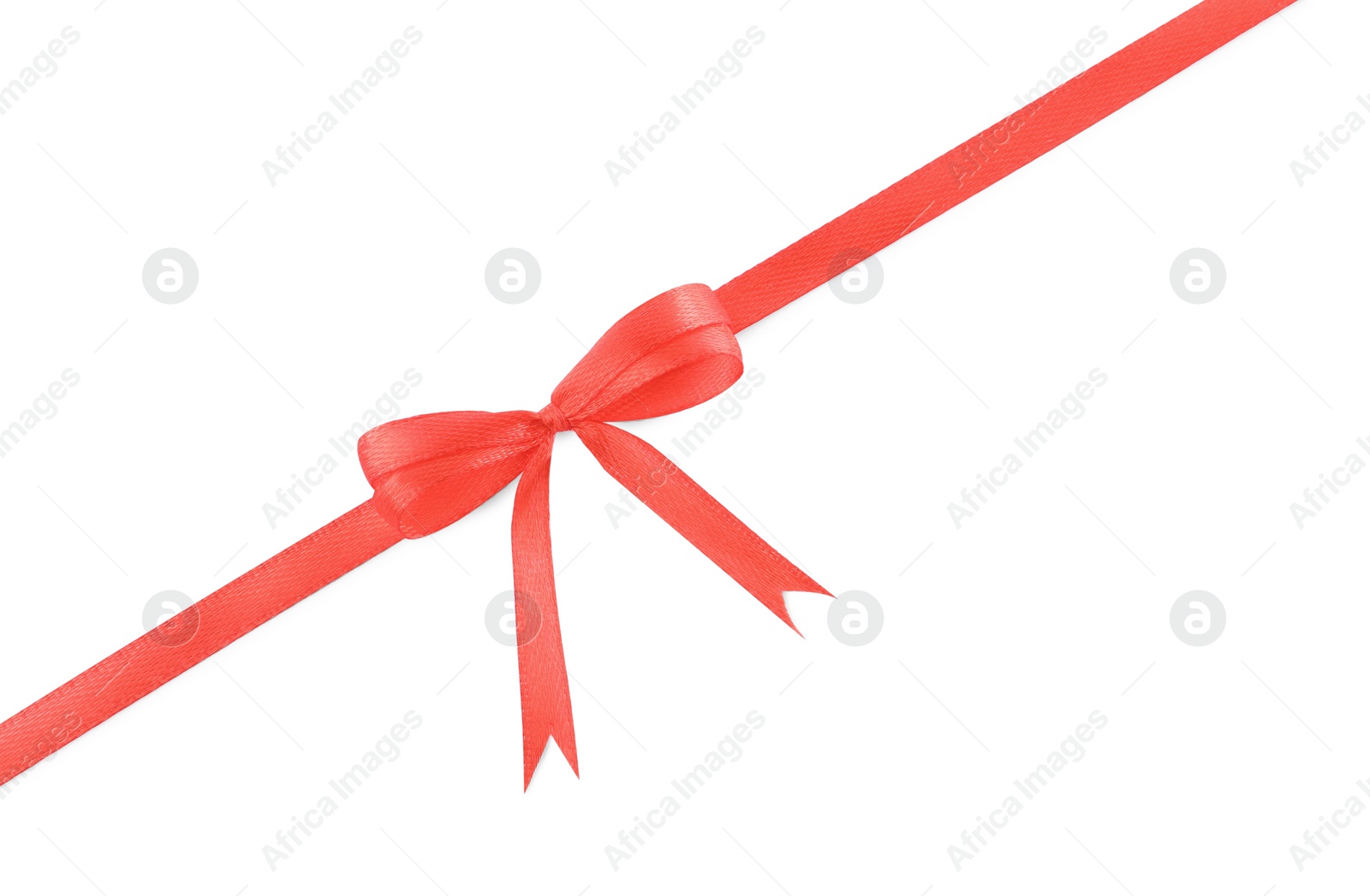 Photo of Red satin ribbon with bow on white background, top view