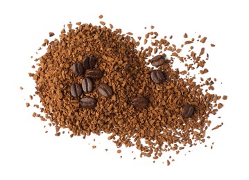 Photo of Heap of instant coffee and beans on white background, top view