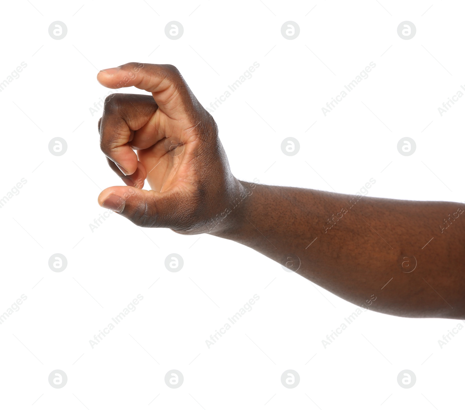 Photo of African-American man holding something in hand on white background, closeup