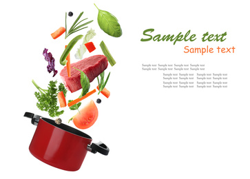 Image of Pot and fresh ingredients for soup on white background. Space for text