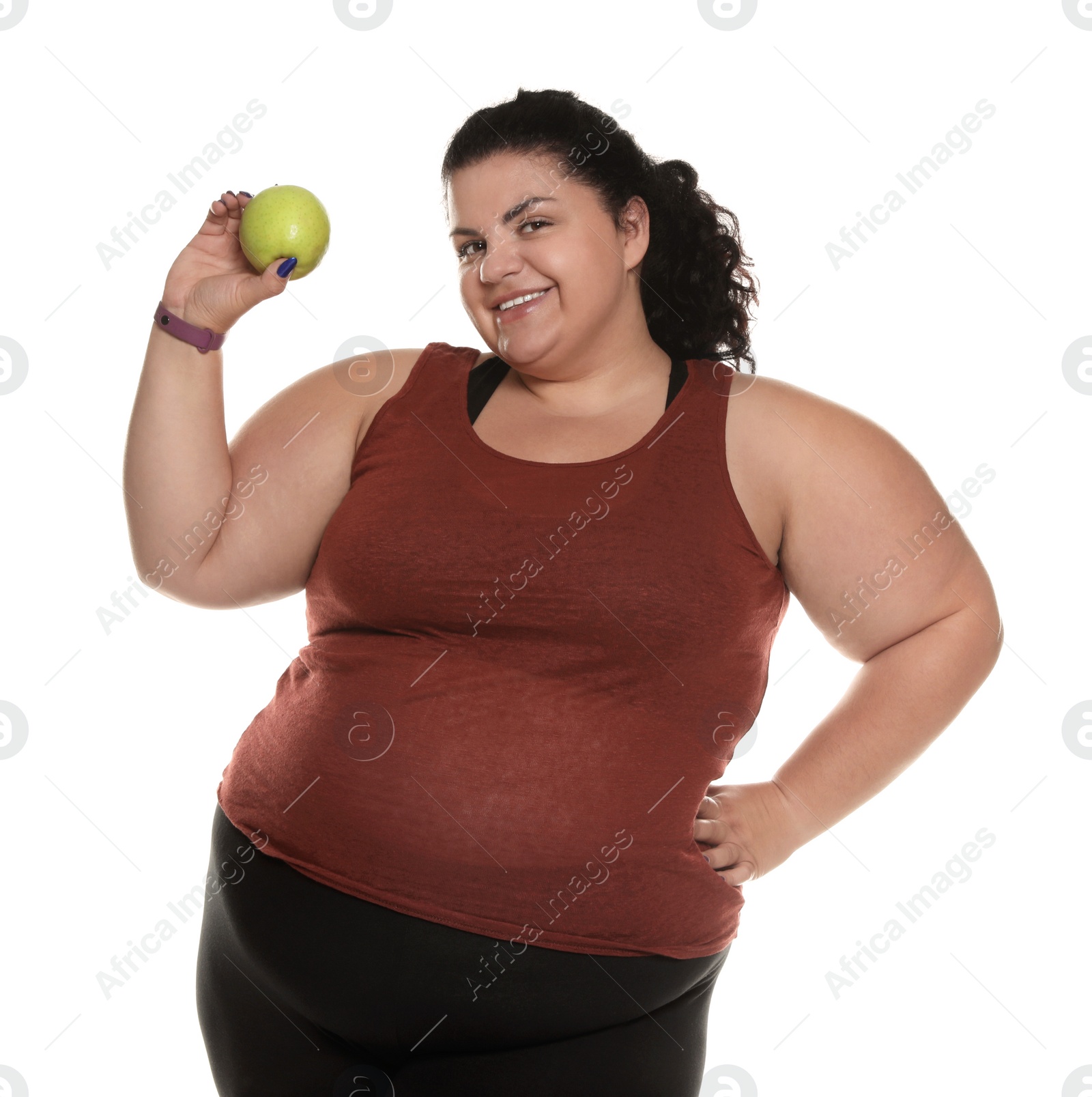 Photo of Happy overweight woman with apple on white background