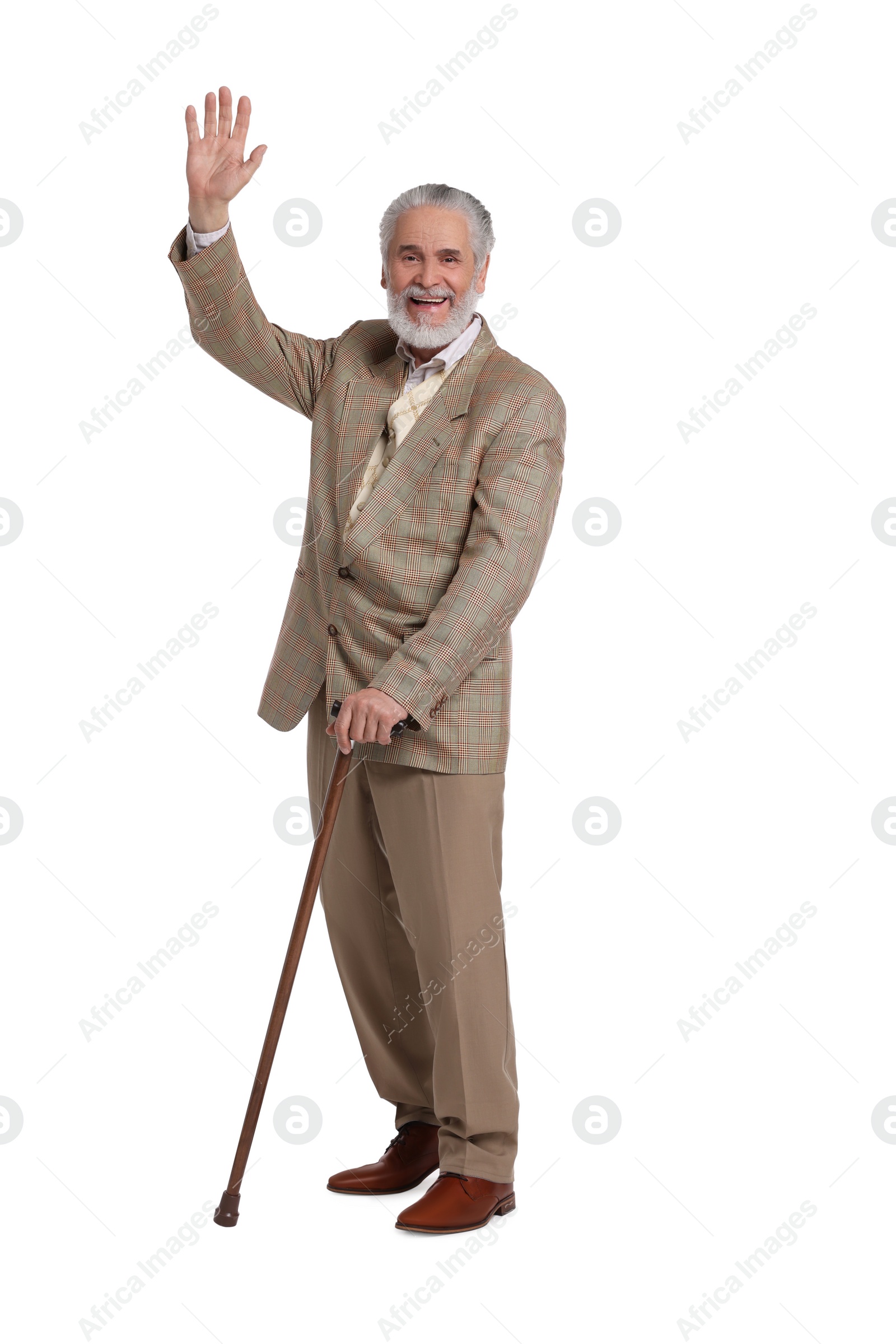 Photo of Senior man with walking cane waving on white background