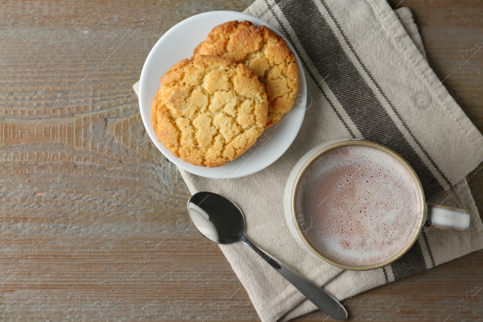 Photo of Composition with delicious hot cocoa drink and cookies on wooden background, flat lay