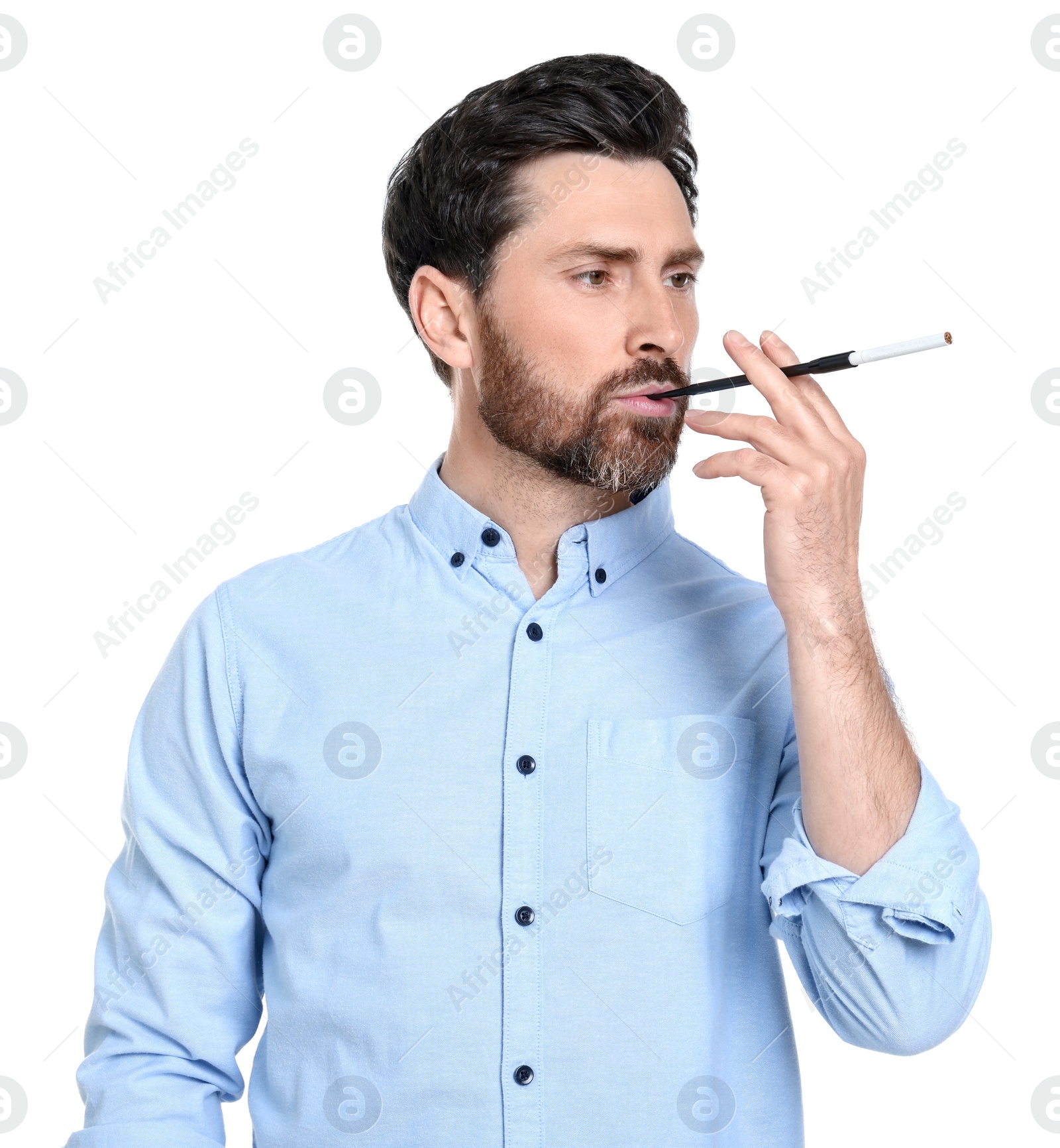 Photo of Man using long cigarette holder for smoking isolated on white