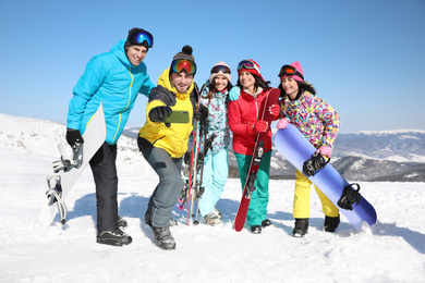 Photo of Group of friends taking selfie outdoors. Winter vacation