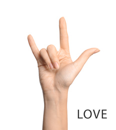 Image of Woman showing word Love on white background, closeup. American sign language