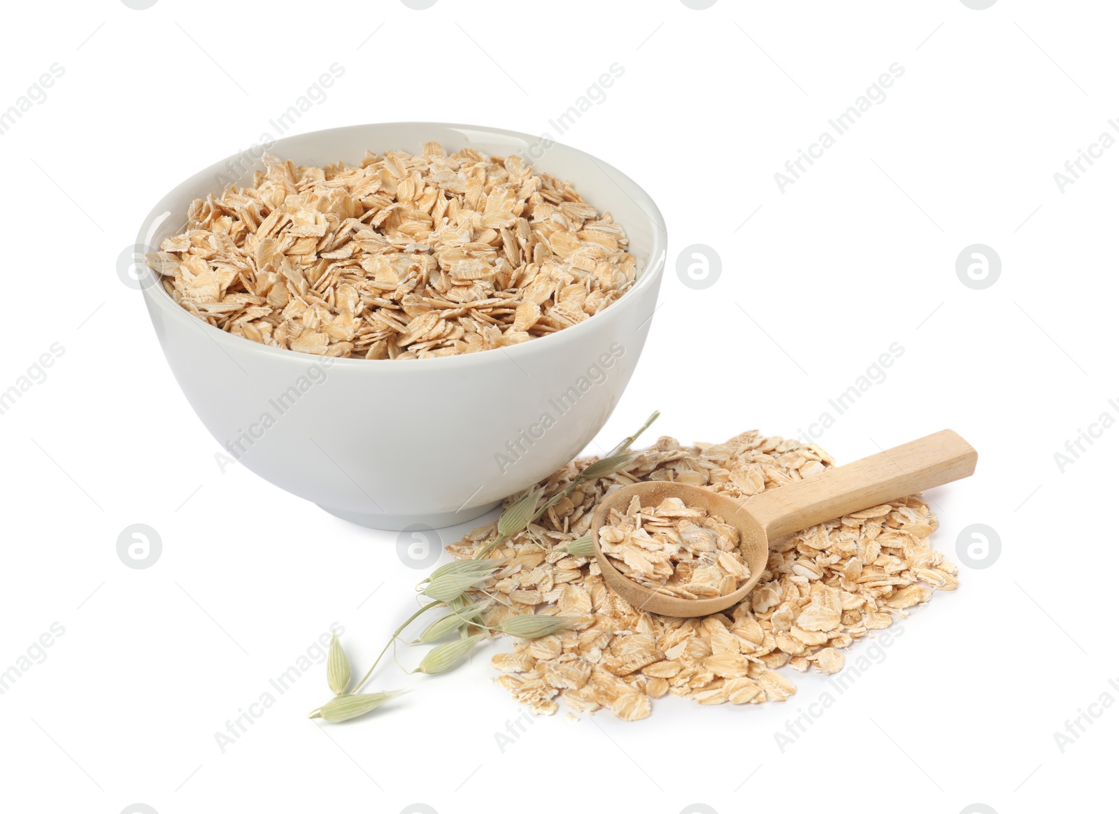 Photo of Oatmeal and branches with florets isolated on white