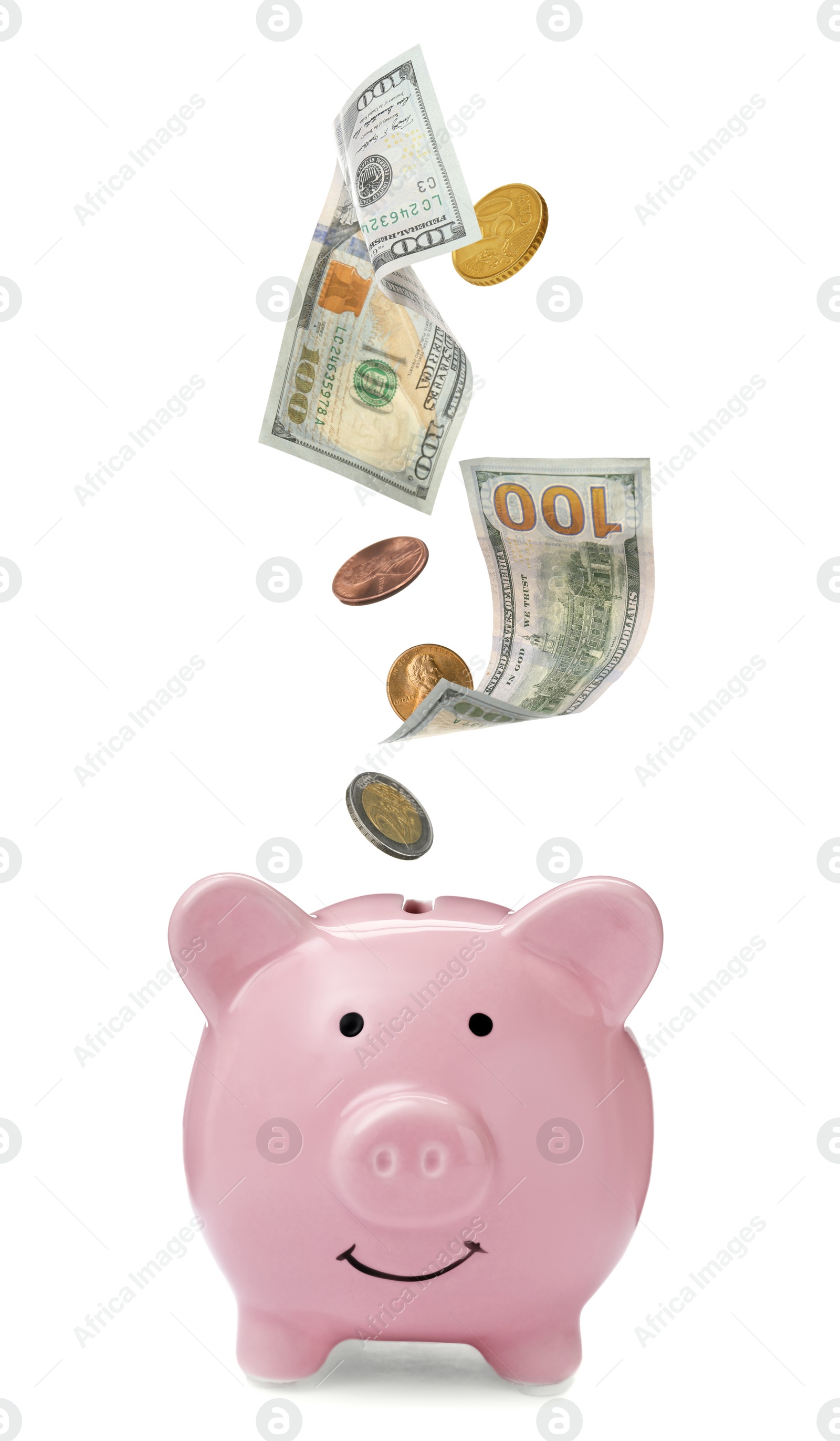 Image of Banknotes and coins falling into piggy bank on white background. Saving money