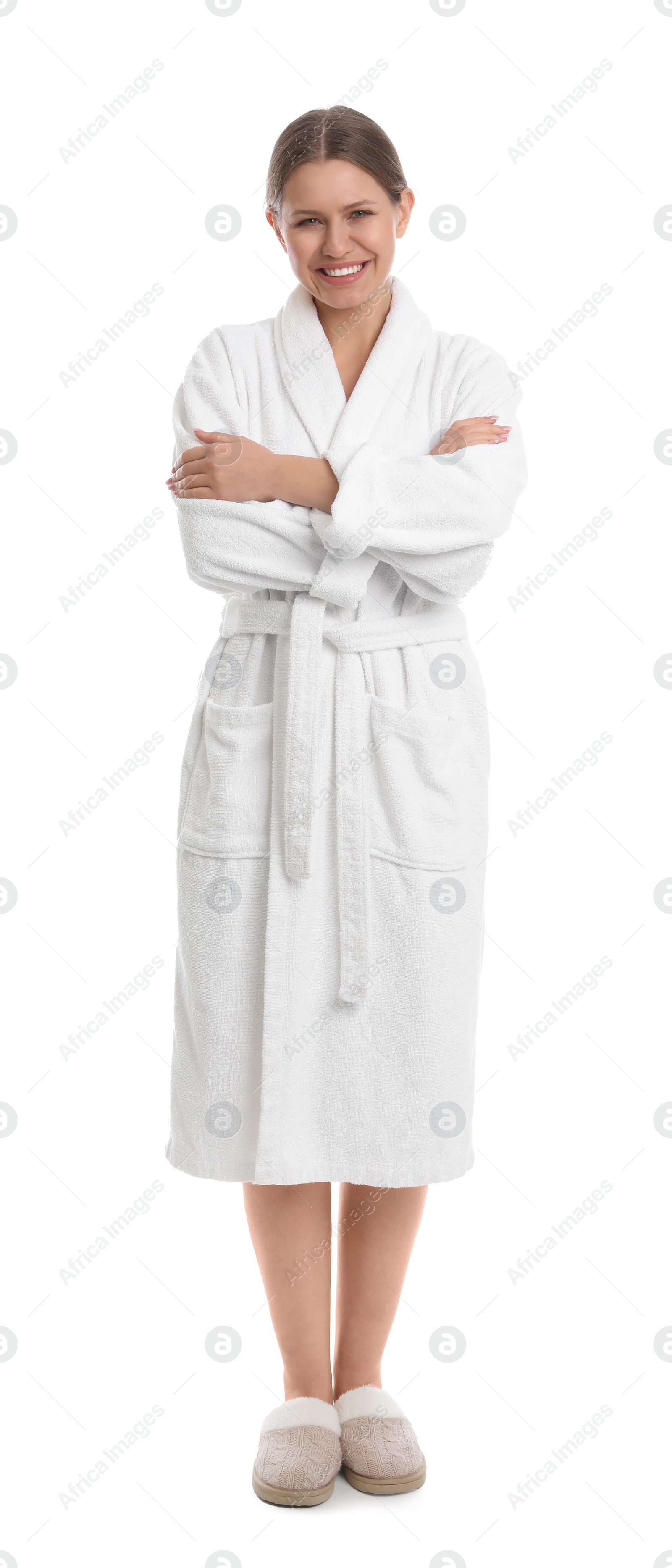 Photo of Young woman in bathrobe on white background