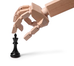Photo of Robot touching king isolated on white. Wooden hand representing artificial intelligence playing chess